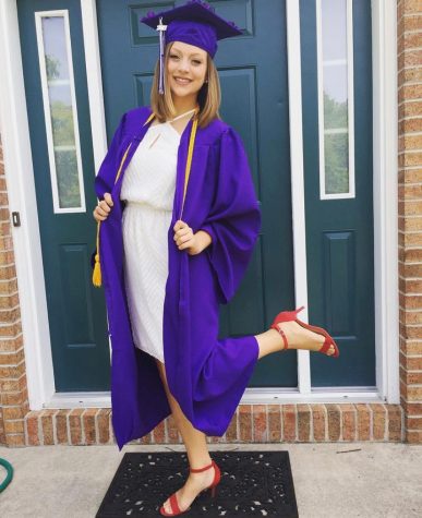 High school senior, Madelyn Falk, poes in her graduation cap and gown in 2017. 