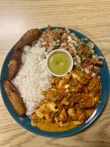 Mehrings order of pollo en coco (coconut chicken) with a side of pico de gallo, rice, and fried plantains.
