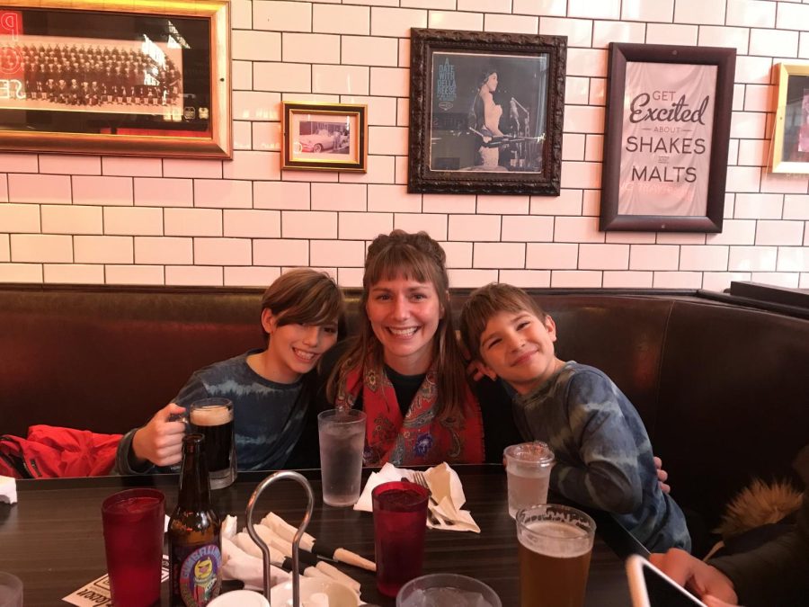 Shum sitting with her two sons at a restaurant in Chicago during one of her sons 11th birthday on New Years Eve.