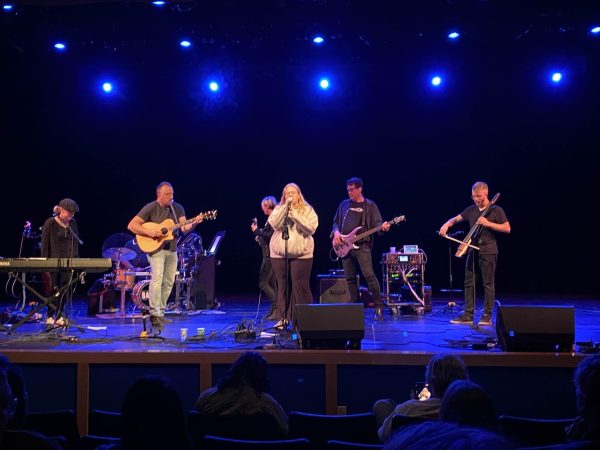 BAWKS performing a song with SHS student Annelise "Bug" Dargel.